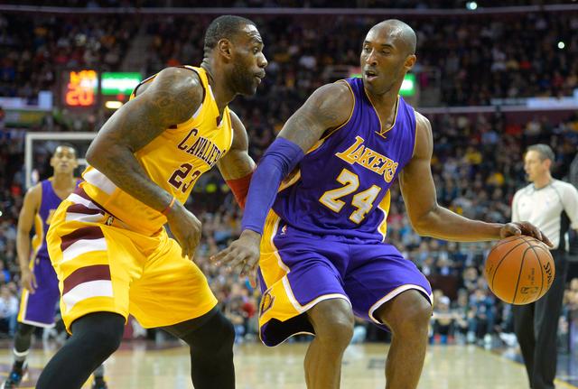 Feb 10, 2016; Cleveland, OH, USA; Cleveland Cavaliers forward LeBron James (23) defends Los Angeles Lakers forward Kobe Bryant (24) in the first quarter at Quicken Loans Arena. Mandatory Credit: David Richard-USA TODAY Sports