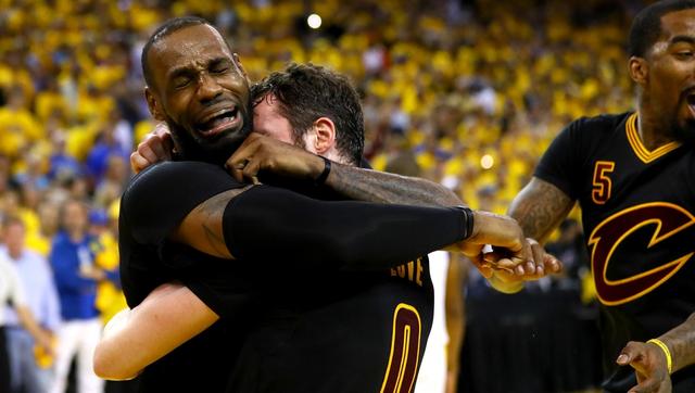 OAKLAND, CA - JUNE 19:  LeBron James #23 and Kevin Love #0 of the Cleveland Cavaliers celebrate after defeating the Golden State Warriors 93-89 in Game 7 of the 2016 NBA Finals at ORACLE Arena on June 19, 2016 in Oakland, California. NOTE TO USER: User expressly acknowledges and agrees that, by downloading and or using this photograph, User is consenting to the terms and conditions of the Getty Images License Agreement.  (Photo by Ezra Shaw/Getty Images)