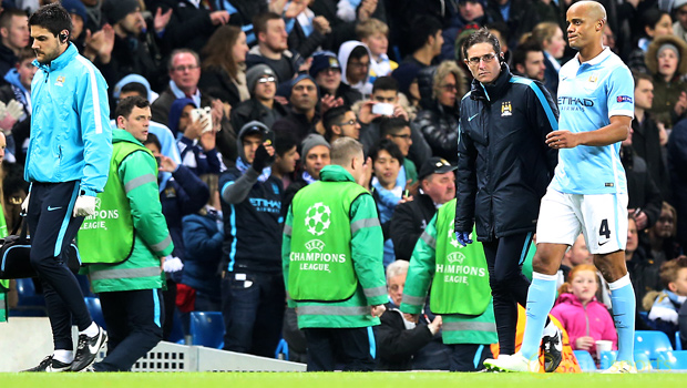 Man-City-boss-Manuel-Pellegrini-and-Vincent-Kompany